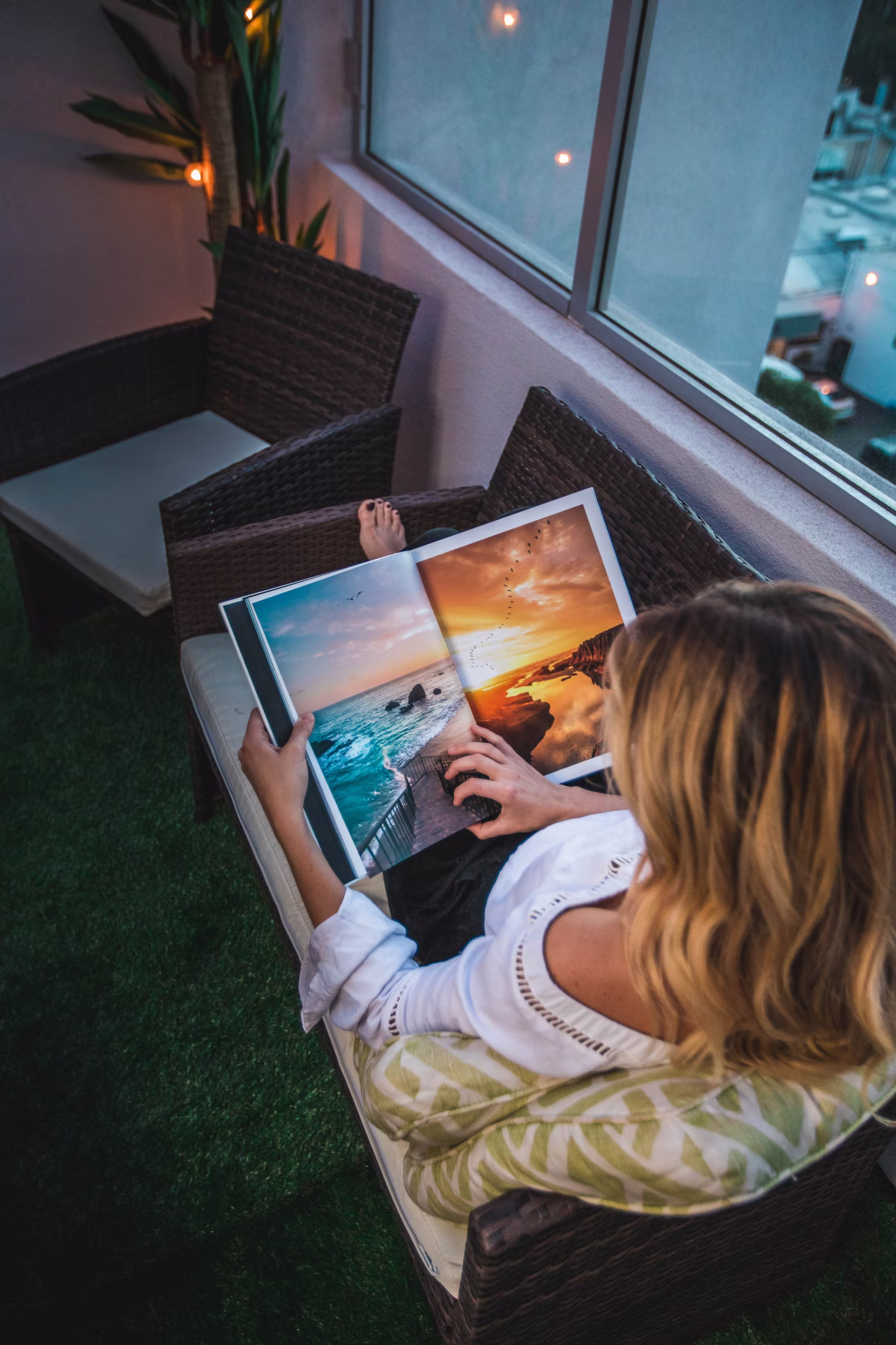 Guest using tablet in coastal vacation rental